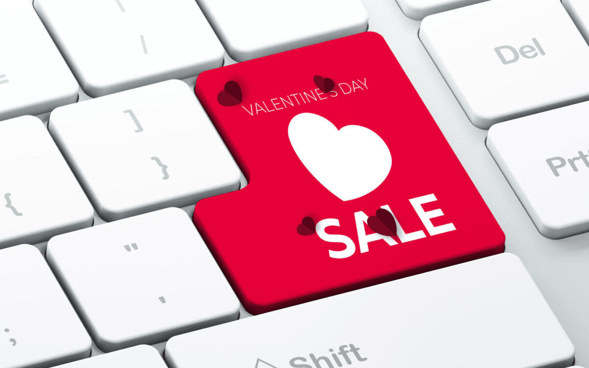 Heart shape key that reads sale on a computer keyboard