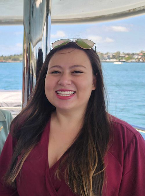 Values Smiling woman on a boat in the harbor