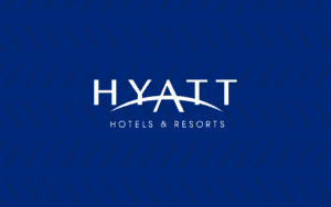 Navy blue background with faded slants white Hyatt logo center in the image