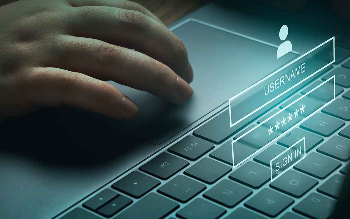 Banner of woman using laptop with VR interface on keyboard.