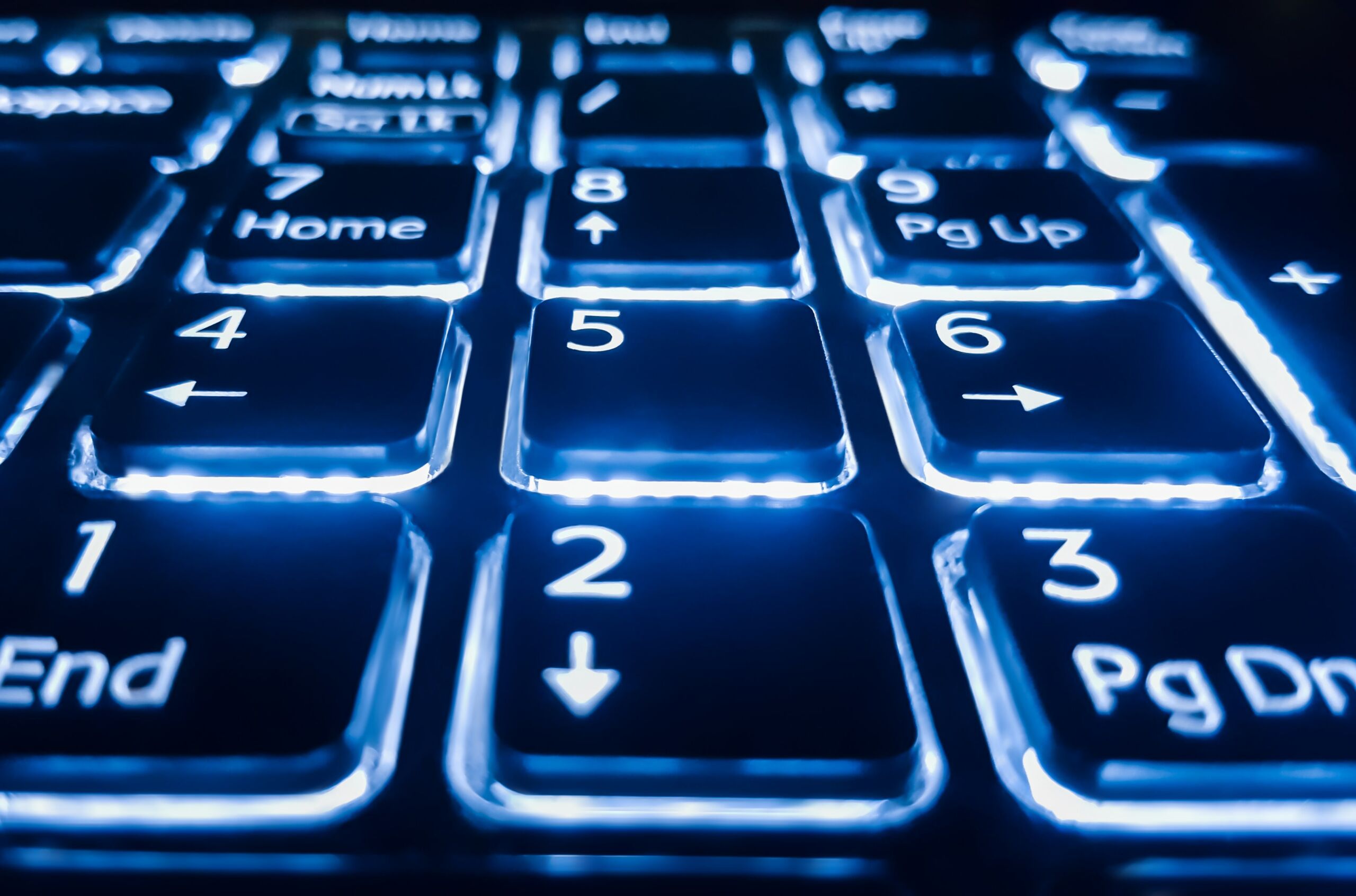 blue illuminated keyboard keys