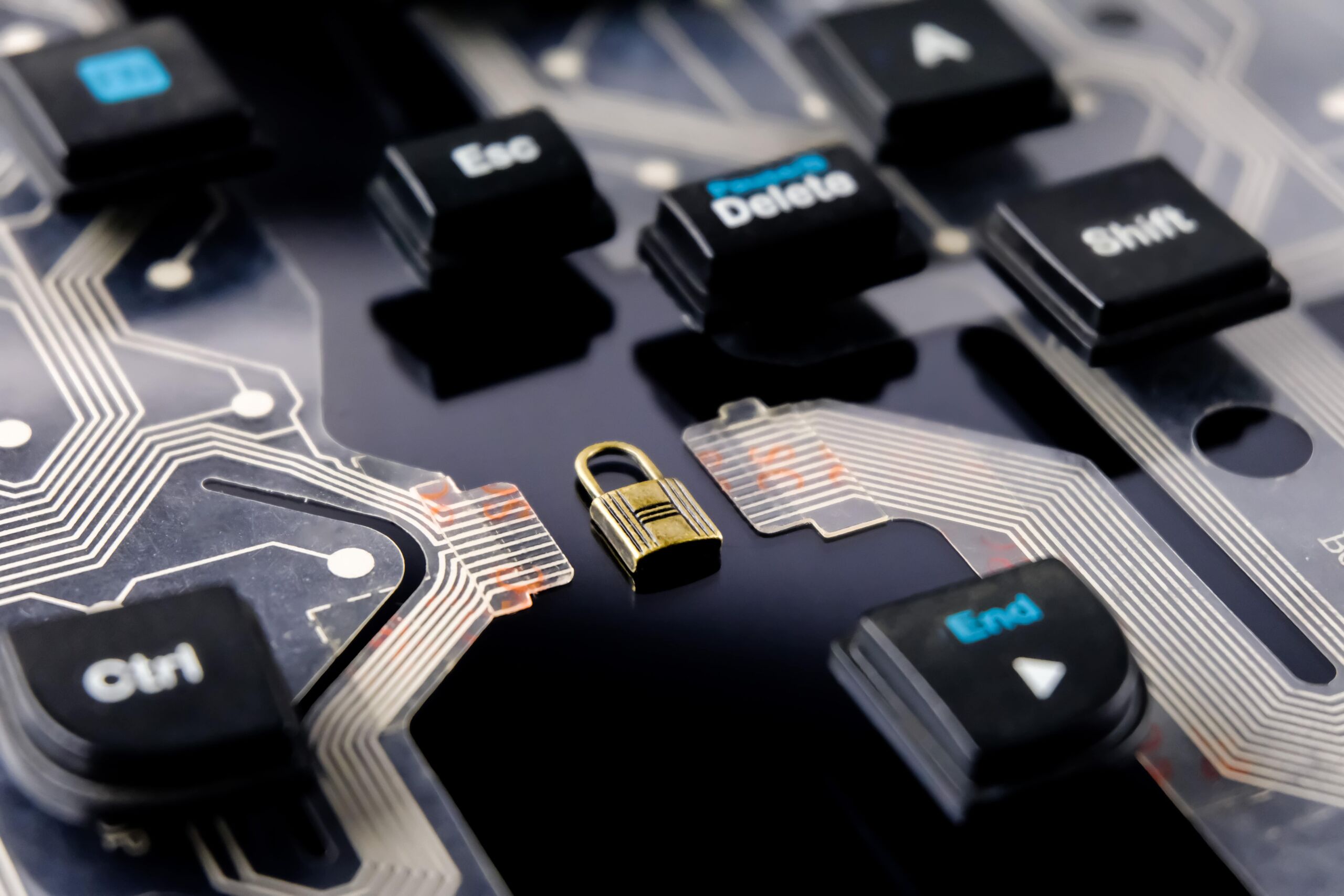 A close up of a keyboard with a CAPTCHA padlock on it.